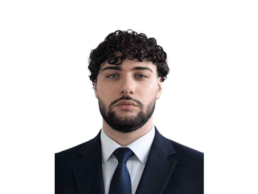 Portrait von Angelo Wambach, IT-Systemadministrator